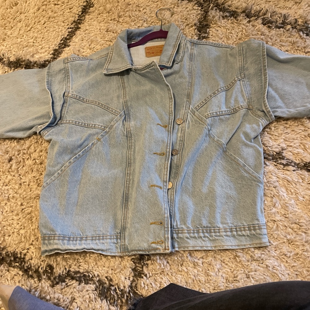 Light blue denim jacket with a vintage vibe